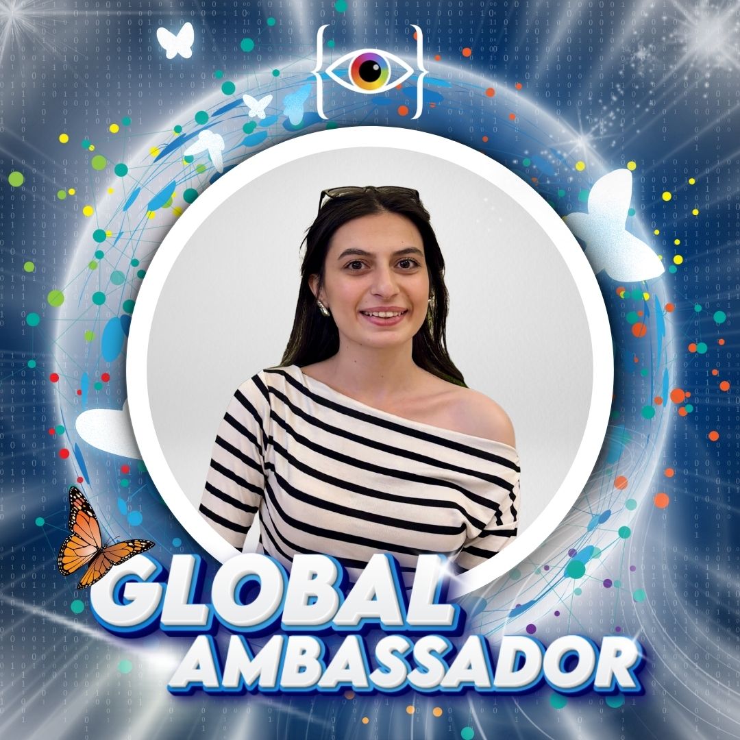 Brightly colored badge with Global Ambassador, the I AM WHO I SAY I AM monarch butterfly and coding brackets with the rainbow eye representing the global growth of I AM WHO I SAY I AM.Global in the country of Türkiye