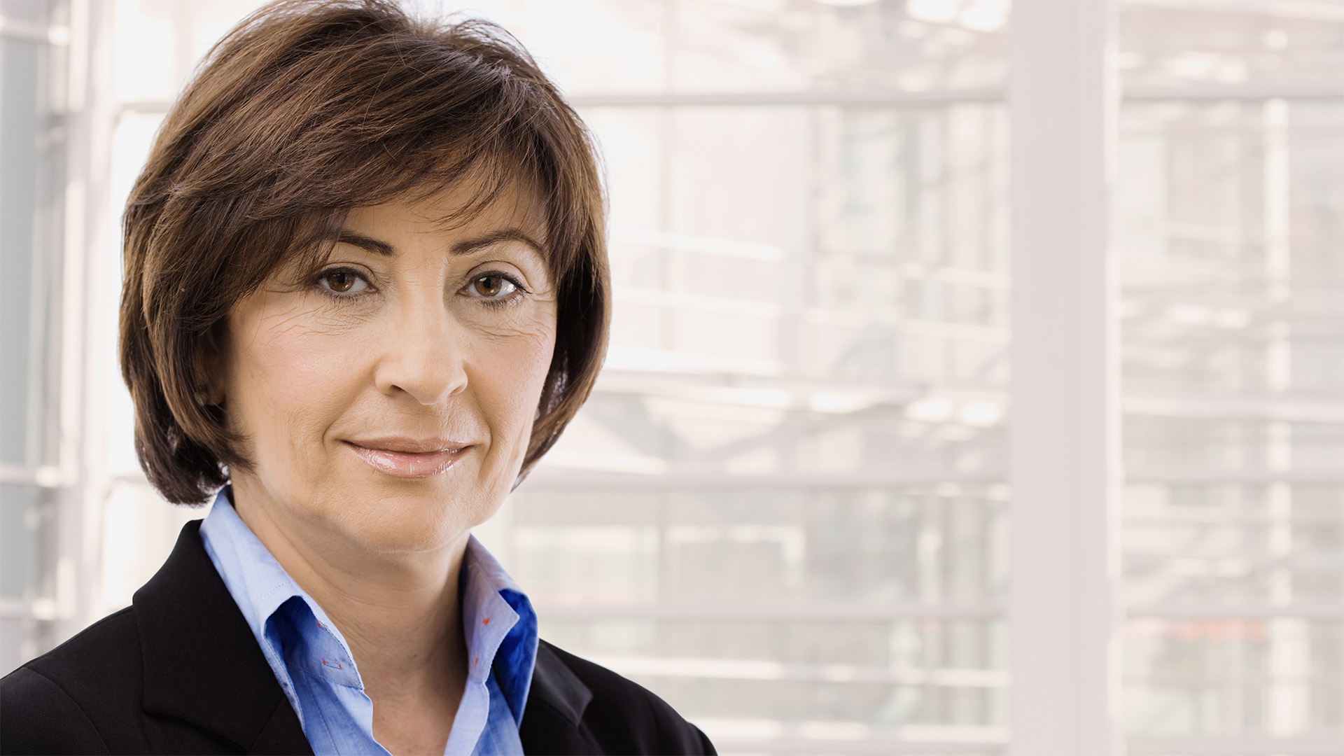 Executive woman in technology sponsoring I AM WHO I SAY I AM for women